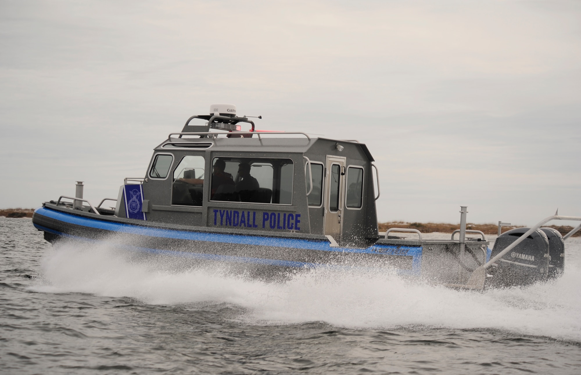 Defenders from the 325th Security Forces Squadron patrol the coastline around Tyndall Jan. 26, in the Valor Class North River Boat. The new boats will advance the 325th SFS provide force protection to 128 miles of shoreline in support of 325th Fighter Wing and 30 associate units. (U.S. Air Force photo by Senior Airman Solomon Cook/Released) 