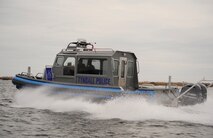 Defenders from the 325th Security Forces Squadron patrol the coastline around Tyndall Jan. 26, in the Valor Class North River Boat. The new boats will advance the 325th SFS provide force protection to 128 miles of shoreline in support of 325th Fighter Wing and 30 associate units. (U.S. Air Force photo by Senior Airman Solomon Cook/Released) 