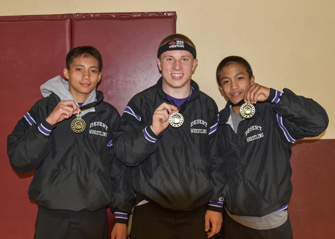 Desert High Scorpions varsity wrestling team members (left to right) LeAaron Santos, Charles Dobbin and Charles Martinez, will compete at the CIF championships Feb. 19 in Corona, California. (Courtesy photo)