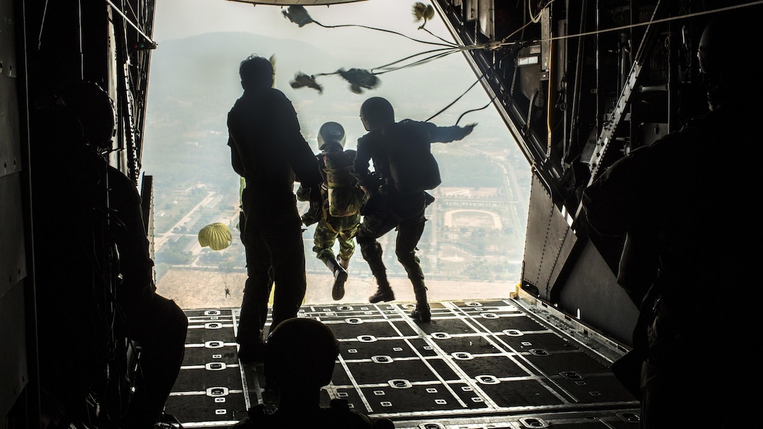 United States and Royal Thai Special Forces conduct a partnership airborne exercise from a MC-130 Hercules in Phitsanulok District, Thailand, during exercise Cobra Gold, Feb. 16, 2016. Cobra Gold is a multinational training exercise developed to strengthen security and interoperability between the Kingdom of Thailand, the U.S. and other participating nations. 