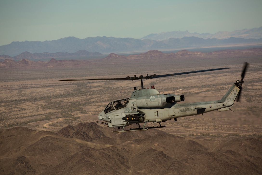 A AH-1W “Super Cobra” attack helicopter with Marine Light Attack Helicopter Squadron 469, based out of Marine Corps Air Station Camp Pendleton, Calif., provides close air support during exercise “Scorpion Fire” at the Chocolate Mountain Aerial Gunnery Range, Friday, Feb. 5, 2016.