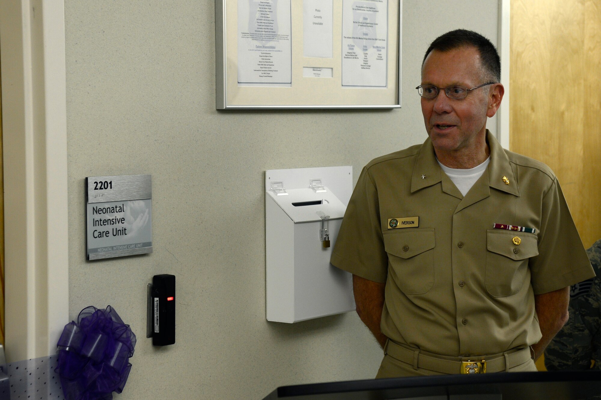 U.S. Navy Rear Adm. Kenneth Iverson, commander of Navy Medicine East and the Tidewater Enhanced Multi-service Market, speaks during a ribbon cutting for the opening of the level II Neonatal Intensive Care Unit (NICU) at Langley Air Force Base, Va., Feb. 12, 2016. The level II NICU, which is the only one in an Air Force hospital, will provide care of babies as young as 32-weeks or babies with unexpected medical complications. (U.S. Air Force photo by Senior Airman Kayla Newman)