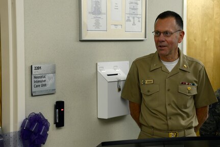 U.S. Navy Rear Adm. Kenneth Iverson, commander of Navy Medicine East and the Tidewater Enhanced Multi-service Market, speaks during a ribbon cutting for the opening of the level II Neonatal Intensive Care Unit (NICU) at Langley Air Force Base, Va., Feb. 12, 2016. The level II NICU, which is the only one in an Air Force hospital, will provide care of babies as young as 32-weeks or babies with unexpected medical complications. (U.S. Air Force photo by Senior Airman Kayla Newman)