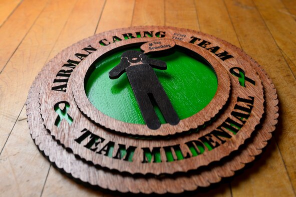 The “#SaySomething” Traveling Trophy sits on a stage after the “#SaySomething: Bystander Intervention Initiative” training seminar Feb. 9, 2016, in the base theater on RAF Mildenhall, England. The trophy was created by the Sexual Assault Prevention and Response office to recognize individuals who stepped up during bystander intervention skits around base. The trophy is awarded to the unit of the Airman that intervened to encourage others to do the same. (U.S. Air Force photo by Staff Sgt. Micaiah Anthony/Released)