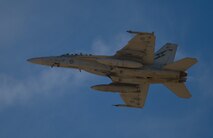 A Royal Australian Air Force F/A-18F Super Hornet flies over Nellis AFB, Nev., during Red Flag 16-1, Feb. 5, 2016. Red Flag 16-1’s training is centered on readiness through completing combat-realistic missions in a degraded, operationally limited environment. (U.S. Air Force photo by Senior Airman Alex Fox Echols III/Released)  