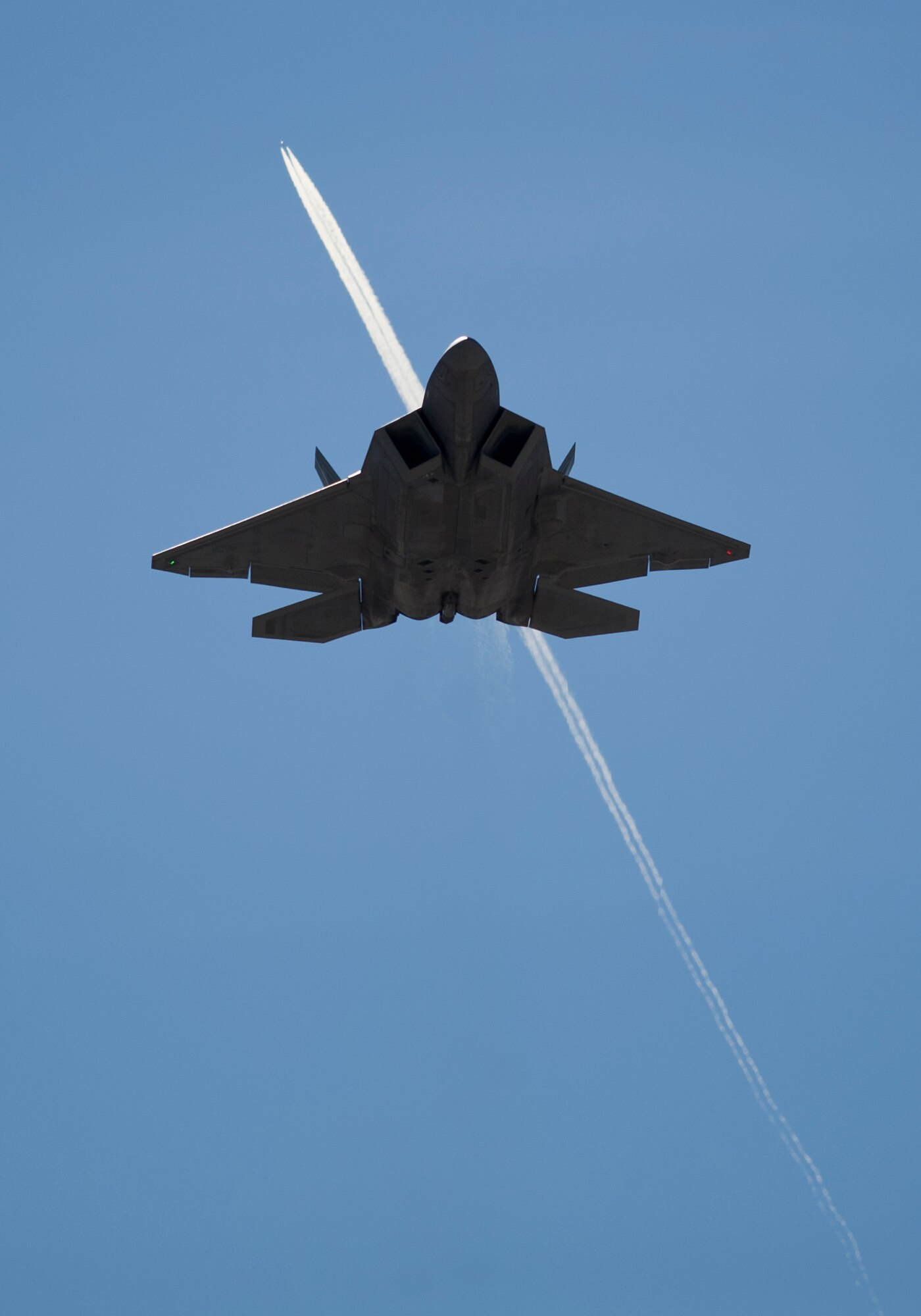 An F-22 Raptor from Tyndall AFB, Fla. flies over Nellis AFB, Nev., during Red Flag 16-1, Feb. 5, 2016. Integration is key at Red Flag, and Tyndall’s F-22s and Airmen join more than 130 aircraft and 3,000 personnel training during the exercise. (U.S. Air Force photo by Senior Airman Alex Fox Echols III/Released)   