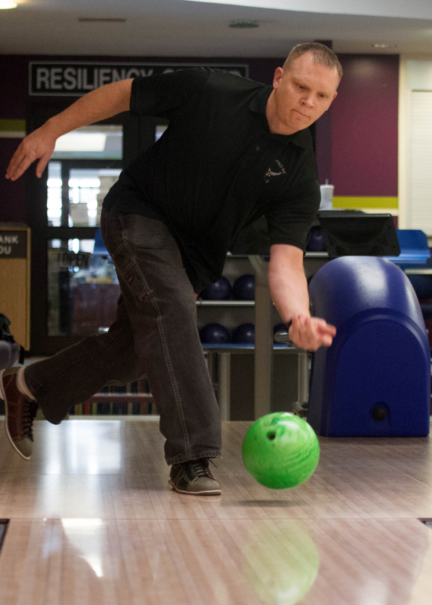 Tech Sgt. Mike Sorenson, Joint Personal Property Shipping Office-Northeast Administrative Services NCO in charge, releases the ball while bowling at Hanscom Lanes Feb 12. This month Hanscom Lanes is offering events for bowlers of all ages. Visit http://www.hanscomservices.com/HanscomLanes.asp for more information. (U.S. Air Force photo by Jerry Saslav)