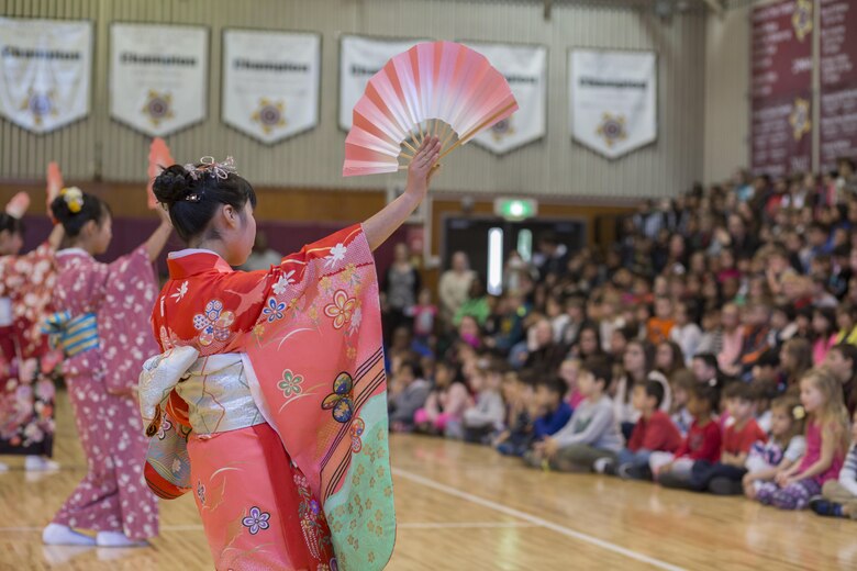 Children from the Shunan International Children’s Club perform a traditional Japanese dance during a cultural exchange at Matthew C. Perry Elementary School at Marine Corps Air Station Iwakuni, Japan, Feb. 11, 2016. The children’s club performs annually at the elementary school and in turn invites the school to the Hinamatsuri festival every year.  These Japanese cultural exchange events showcase the nation’s unique culture in hopes of deepening friendships and understanding.