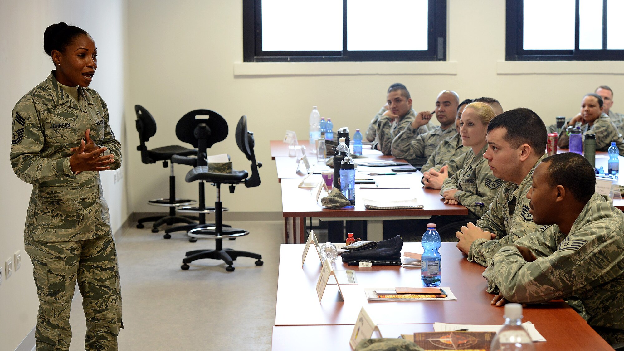 U.S. Air Force Chief Master Sgt. Shanece Johnson, 31st Fighter Wing command chief, speaks to staff sergeants during an NCO Professional Enhancement Seminar at Aviano Air Base, Italy, Feb. 11, 2016. Johnson discussed her three Fs – family, fun and finances, and the importance of finding a balance with each. (U.S. Air Force photo by Staff Sgt. R.J. Biermann/Released)