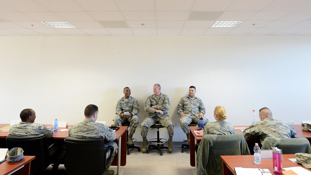 (From left) U.S. Air Force Chief Master Sergeants Carey Jordan, 31st Civil Engineer Squadron superintendent, Eric Markel, 31st Maintenance Group superintendent, and Senior Master Sgt. Bobby Hickman, 31st Operations Support Squadron superintendent, field questions on the new Enlisted Performance Report process during an NCO Professional Enhancement Seminar at Aviano Air Base, Italy, Feb. 11, 2016. The three-day seminar that covered topics ranging from the Enlisted Force Structure to healthy living and focused primarily on junior NCOs taking care of Airmen. (U.S. Air Force photo by Staff Sgt. R.J. Biermann/Released)