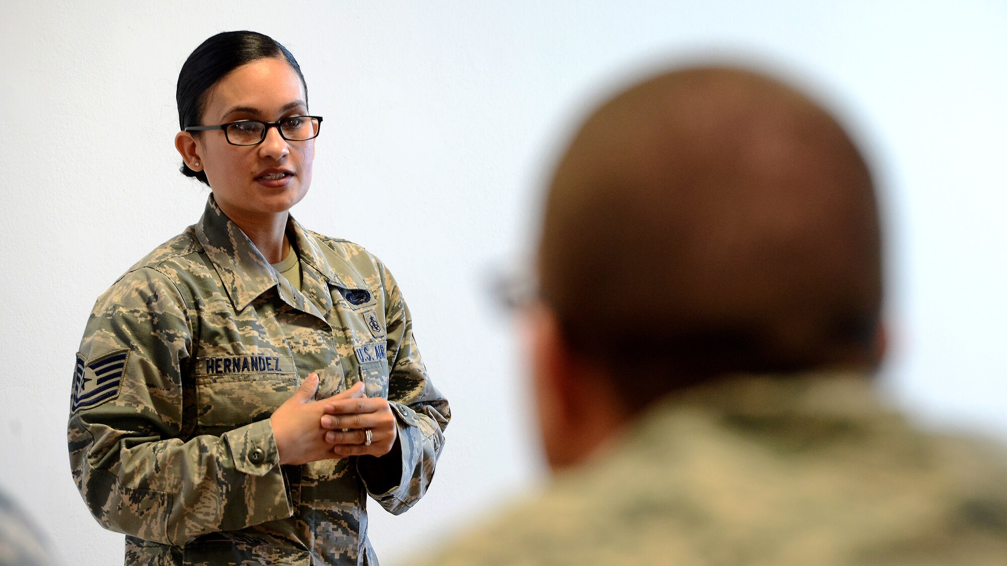 U.S. Air Force Tech. Sgt. Maribelle Hernandez, 31st Force Support Squadron Manpower analyst, discusses resource management during an NCO Professional Enhancement Seminar at Aviano Air Base, Italy, Feb. 11, 2016. The three-day seminar covered topics ranging from the Enlisted Force Structure to healthy living and focused primarily on junior NCOs taking care of Airmen. (U.S. Air Force photo by Staff Sgt. R.J. Biermann/Released)