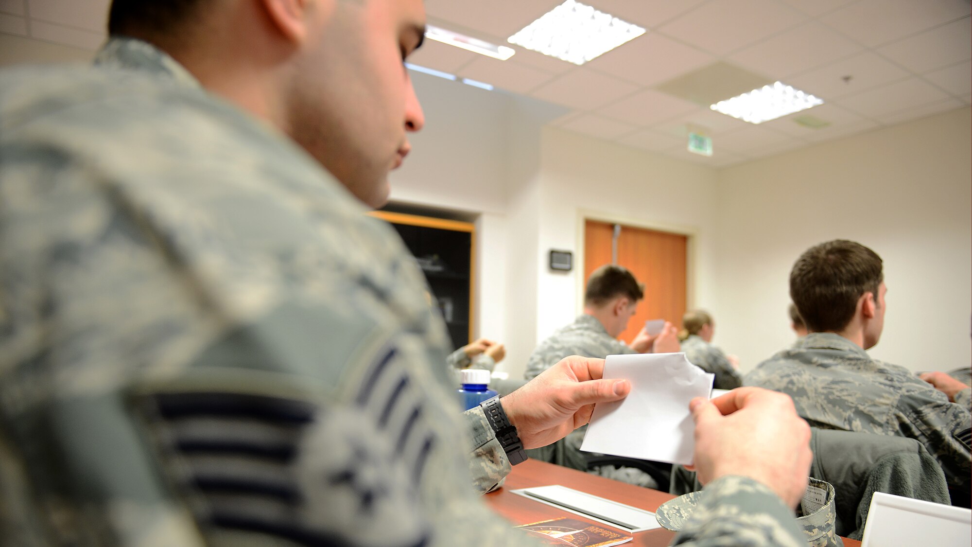 U.S. Air Force Staff Sgt. Adrian Romero, 31st Maintenance Squadron Aircraft structural maintenance craftsman, completes a personality test during a three-day NCO Professional Enhancement Seminar at Aviano Air Base, Italy, Feb. 10, 2016. More than 30 staff sergeants attended NCO PES, which covered topics ranging from the Enlisted Force Structure to healthy living and focused primarily on junior NCOs taking care of Airmen. (U.S. Air Force photo by Staff Sgt. R.J. Biermann/Released)