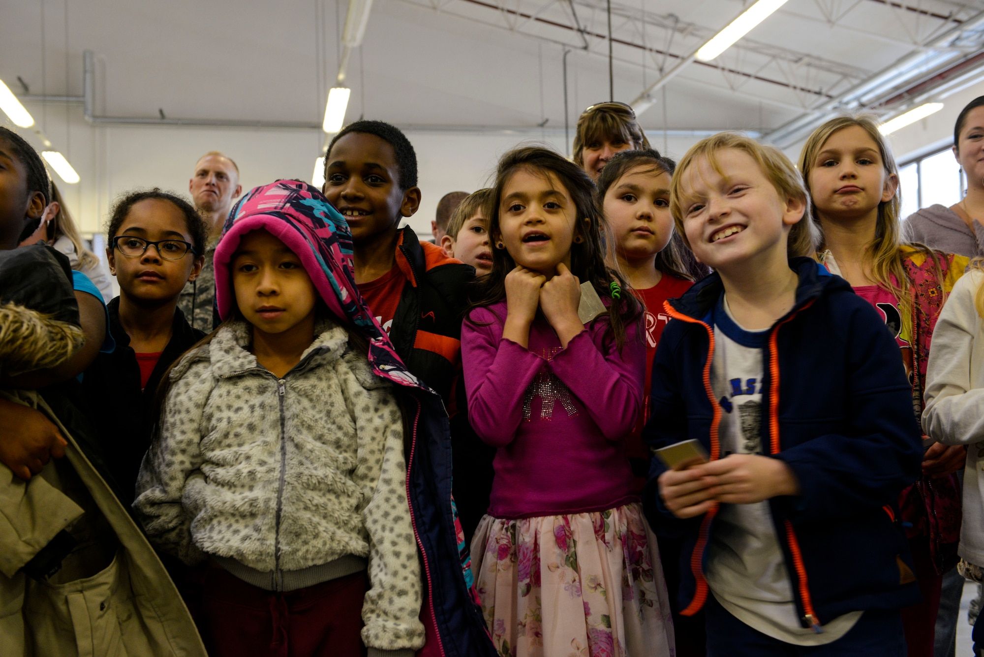 Students from Ramstein Intermediate School watch a presentation at the 786th Civil Engineer Squadron Feb. 12, 2016, at Ramstein Air Base, Germany.  During a tour of the 786th CES, students got a chance to observe Airmen doing their jobs and learn about the impact they have on the mission at Ramstein.  (U.S. Air Force photo/Senior Airman Nicole Sikorski) 