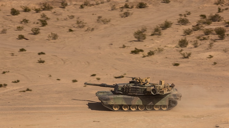 An M1A1 Abrams Main Battle Tanks with Company A, 1st Tank Battalion, scans for adversaries while traversing through the Quackenbush Training Area Tank Mechanized Assault Course as part of Integrated Training Exercise 2-16 at Marine Corps Air Combat Center Twentynine Palms, Calif. Feb. 9, 2016. ITX is designed to prepare units for combat, under the most realistic conditions possible, focusing on battalion and squad level training. 