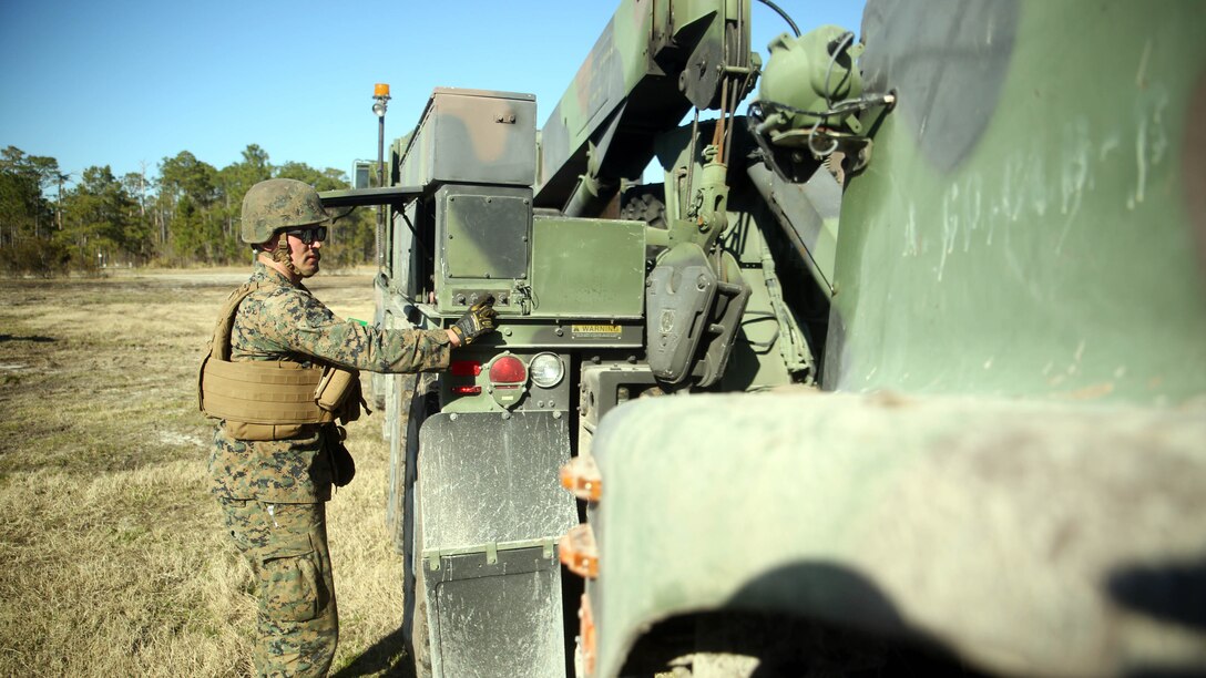 Lance Cpl. Brandon C. Waples, the recovery team leader with Combat Logistics Battalion 6, provides security for an MK36 Wrecker crew during a convoy operations exercise at Marine Corps Base Camp Lejeune, N.C., Feb. 11, 2016. The Marines encountered opposing forces during the convoy and faced both small arms and indirect fire. 