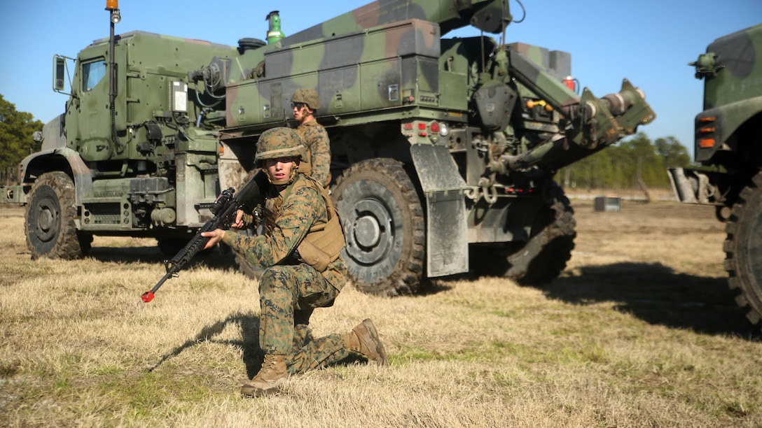 Lance Cpl. Brandon C. Waples, the recovery team leader with Combat Logistics Battalion 6, provides security for an MK36 Wrecker crew during a convoy operations exercise at Marine Corps Base Camp Lejeune, N.C., Feb. 11, 2016. The Marines encountered opposing forces during the convoy and faced both small arms and indirect fire. 