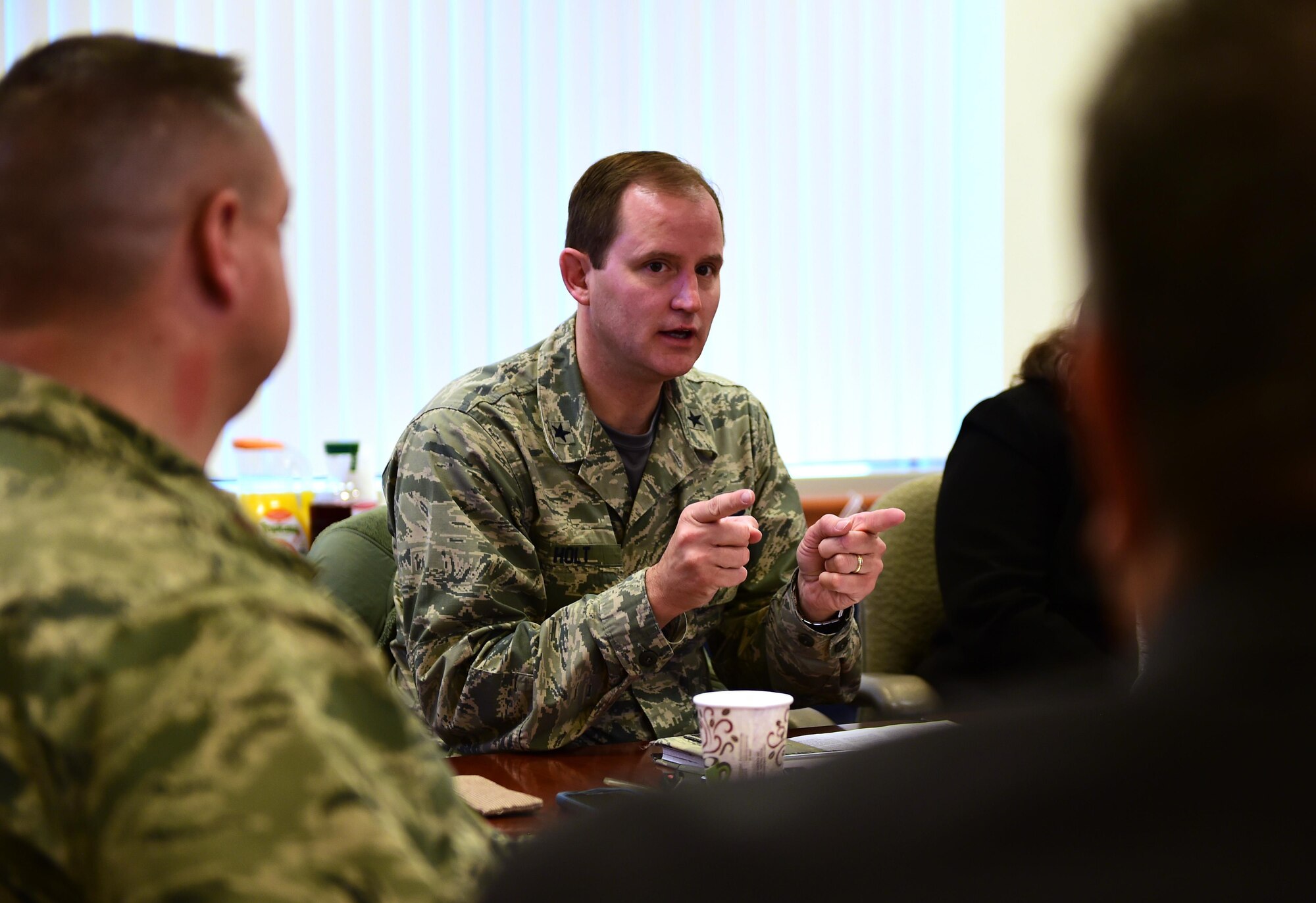 Brig. Gen. Cameron Holt, Air Force Installation Contracting Agency commander, talks about the contracting mission projection Feb. 12, 2016, on Buckley Air Force Base, Colorado. During his visit, Holt expressed his gratitude towards his fellow Airmen and civilian coworkers. (U.S. Air Force photo/Senior Airman Racheal E. Watson/Released)