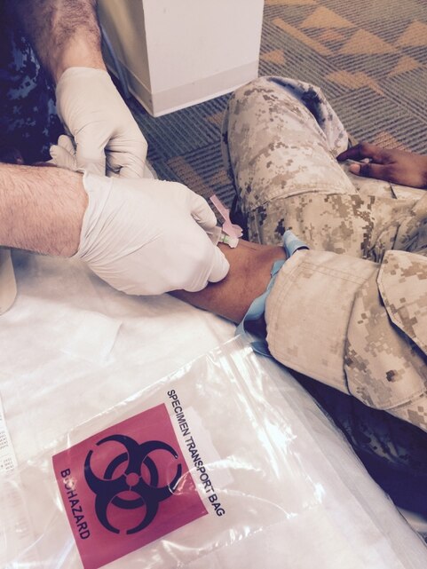 A Marine has blood drawn for testing, an important aspect in remaining healthy.