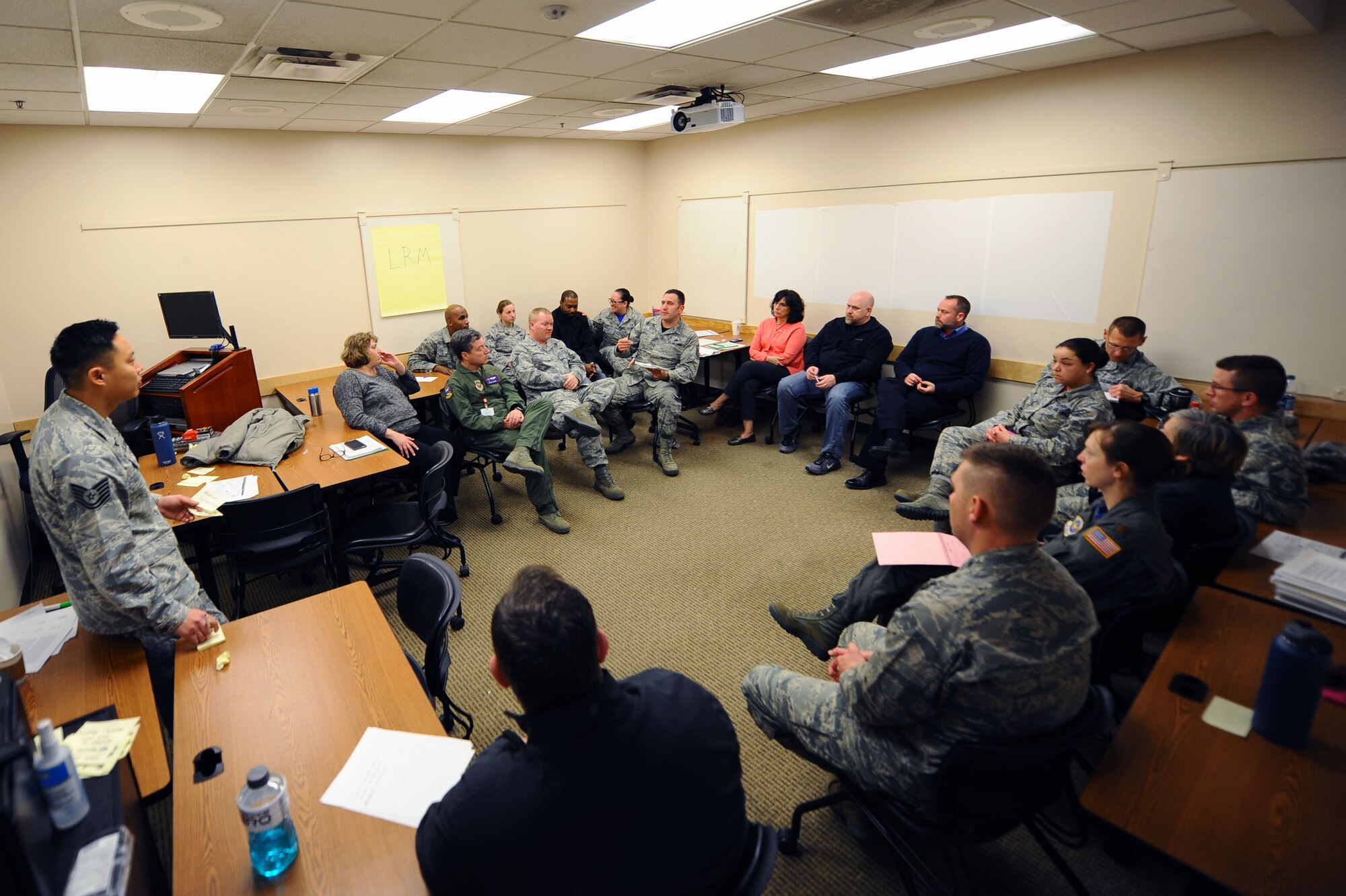 Members of various medical group agencies and unit deployment managers came together to build a better medical waiver system for Airmen deploying during a meeting Continuous Process Improvement, Feb 9, 2016, at McConnell Air Force Base, Kan. This is one of the steps McConnell uses to create ideas to find solutions to pressing problem. (U.S. Air Force photo/Airman 1st Class Christopher Thornbury)