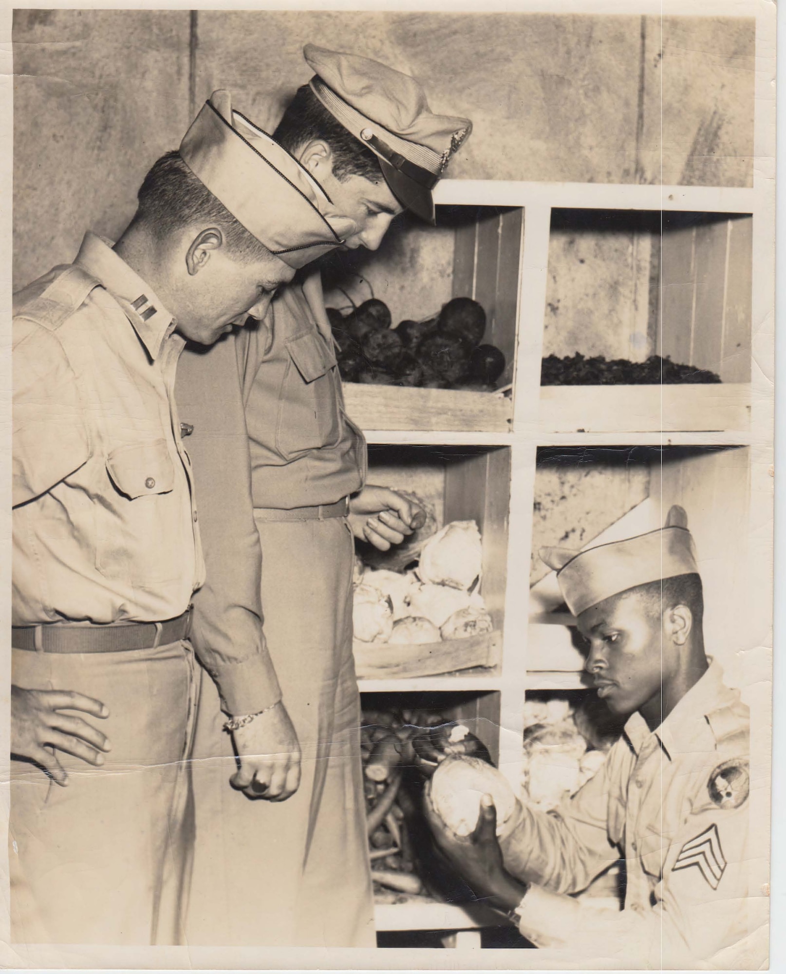 Capt. Harry C. Aderholt, the commander of Squadron F, 2123 Army Air Force, left, conducts a supply inventory at Maxwell Field in September 1945.  He was commander of a segregated African American unit at Maxwell Field.  Captain Aderholt eventually rose to the rank of brigadier general, U.S. Air Force, and was a prominent figure in Air Force Special Operations in the 1950s and 1960s. (Courtesy photo U.S. Air Force)