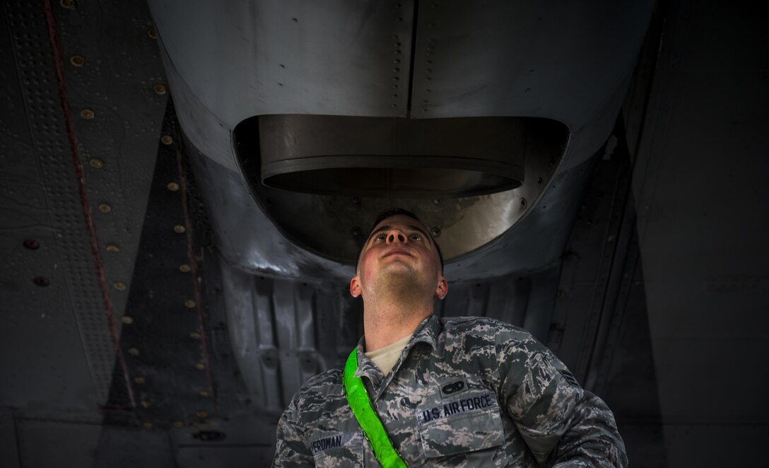 Air Force Senior Airman Jeffrey Erdman conducts pre-flight inspection on a C-130J Super Hercules aircraft on Pope Army Airfield, N.C., Feb. 4, 2016. Erdman is a crew chief assigned to the 19th Aircraft Maintenance Squadron. Air Force photo by Staff Sgt. Marianique Santos