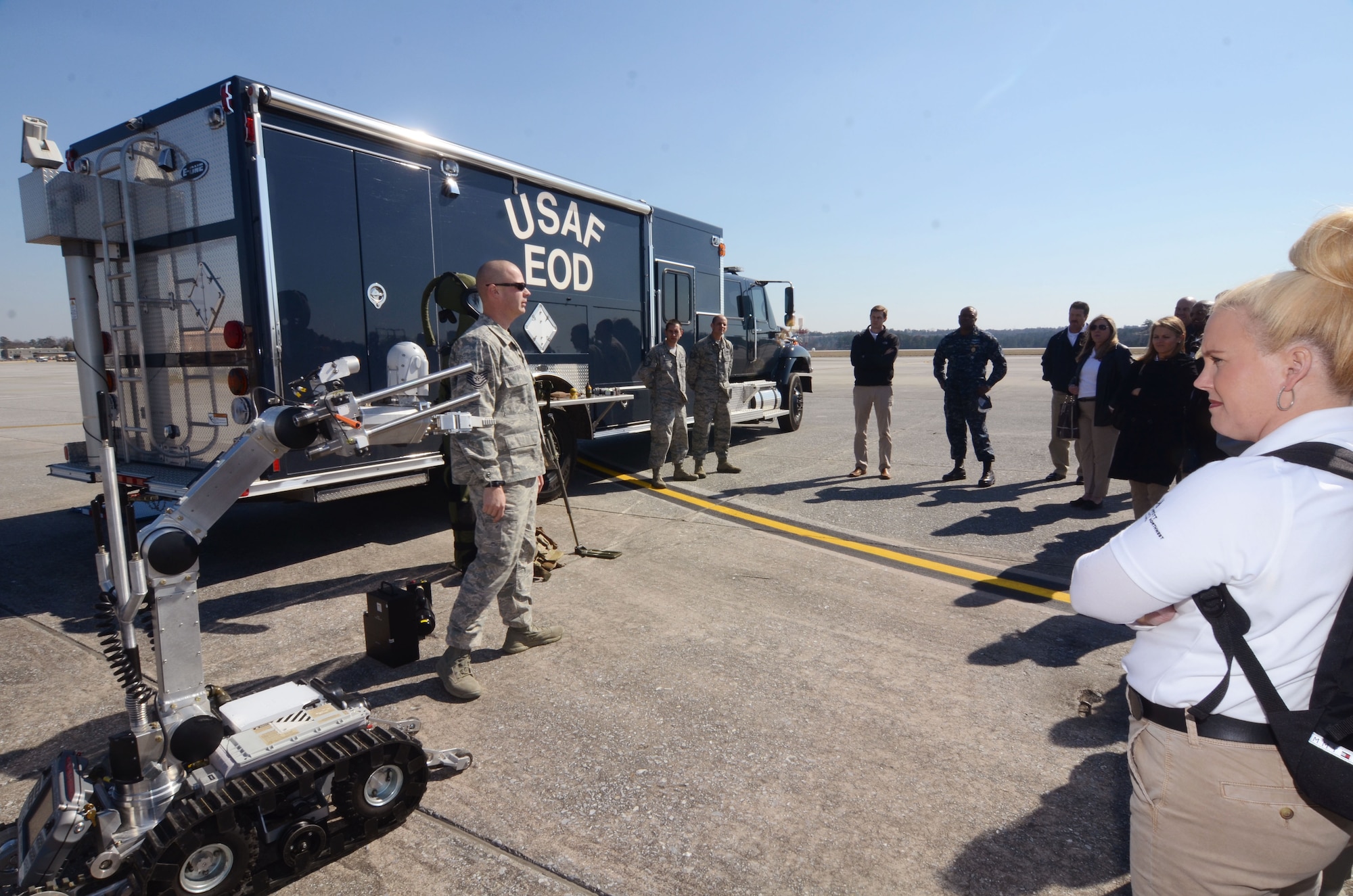 Members of the Honorary Commanders Association recieve a brief from Explosive Ordanance Disposal members  during Dobbins Day, while touring Dobbins Air Reserve Base, Ga. Feb. 12, 2016. (U.S. Air Force photo/Don Peek)