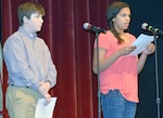 Samuel Swofford (left) and Raquelle Bennett read their essays during
the Joint Base San Antonio-Fort Sam Houston Black History
Month commemoration Feb. 10 at the Fort Sam Houston Theater.