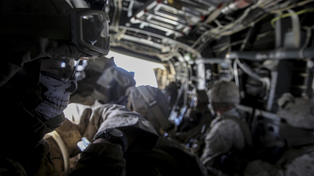 Marines and Sailors with Company F, 2nd Battalion, 7th Marine Regiment, 1st Marine Division, ride in an MV-22B Osprey during tactical recovery of aircraft and personnel training aboard Marine Corps Air Ground Combat Center Twentynine Palms, Calif., Feb. 4, 2016. The training will better prepare 2/7 for their upcoming deployment to the Central Command area of responsibility as the ground combat element for Special Purpose Marine Air Ground Task Force Crisis Response Central Command 16.2, where they will be positioned to conduct TRAP missions in support of Operation Inherent Resolve. (U.S. Marine Corps photo by Cpl. Danielle Rodrigues/Released)