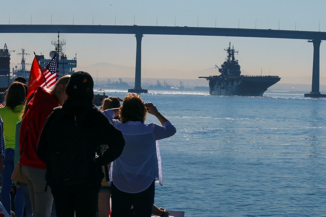 Family and friends line the shore to see the departure of the Marines and sailors of the 13th Marine Expeditionary Unit, I Marine Expeditionary Force, in San Diego Feb. 12, 2016. The 13th MEU is capable of conducting amphibious operations, crisis response and limited contingency operations and is beginning an estimated six-month deployment to the Western Pacific and Middle East. (U.S. Marine Corps photo by Lance Cpl. Caitlin Bevel)