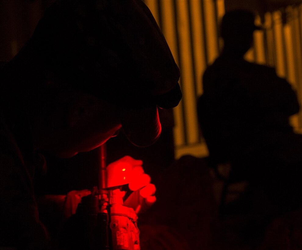 A U.S. Army Soldier from Bravo Company, 3rd Battalion, 15th Infantry Regiment, verifies his laser is properly functioning Feb. 13, 2016, at Camp Lemonnier, Djibouti. The East Africa Response Force serves as a part of U.S. Africa Command’s crisis response capability, and is tasked with responding to emergency situations at U.S. Embassies in the East African region or in countries around the CJTF-HOA area of responsibility. (U.S. Air Force photo by Senior Airman Peter Thompson)
