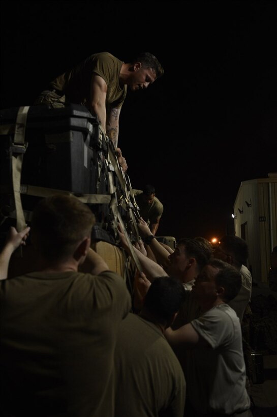 Soldiers from Bravo Company, 3rd Battalion, 15th Infantry Regiment, secure equipment to a pallet Feb. 13, 2016, at Camp Lemonnier, Djibouti. Members of the U.S. Army’s Bravo Company 3-15, from Fort Stewart, Georgia, completed a validation exercise displaying their ability to assume responsibility from Alpha Company 3-15, as the East Africa Response Force assigned to Combined Joint Task Force-Horn of Africa. (U.S. Air Force photo by Senior Airman Peter Thompson)
