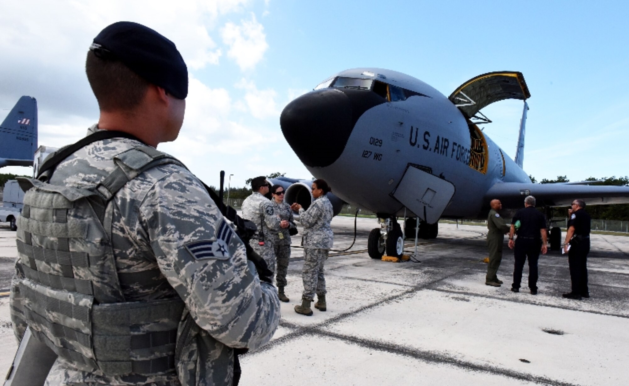 Security forces, firefighters and emergency responders of the 156th Airlift Wing, Muñiz Air National Guard Base, Puerto Rico provide emergency response to the 127th Wing, Selfridge Air National Guard Base, Michigan KC-135 Stratotanker, after reporting engine trouble during their transatlantic airlift mission, Feb. 10, 2016. The PRANG was able to meet the logistical needs of the KC-135 aircrew during their flight emergency due to Puerto Rico's strategic location between the U.S. and Africa. 
(U.S. Air National Guard photos by Tech. Sgt. Marizol Ruiz /Released)
