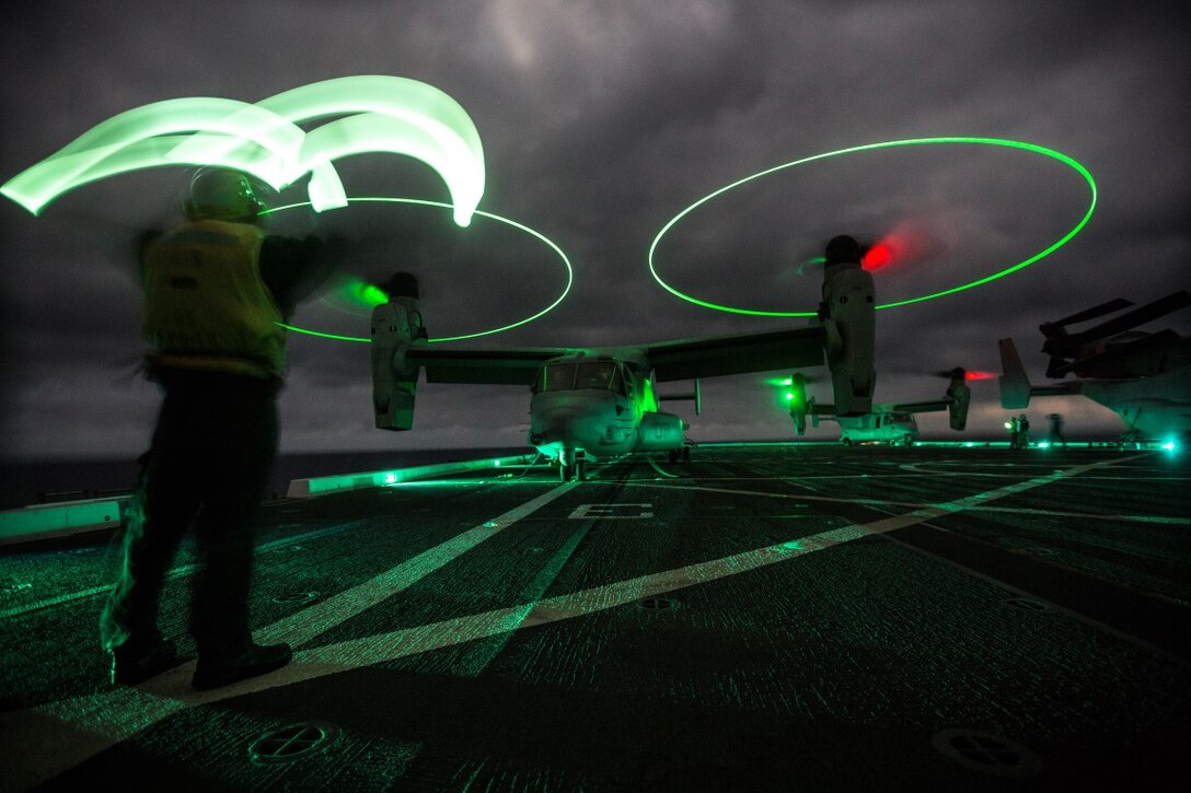 U.S. Navy Sailors with the Boxer Amphibious Ready Group prepare MV-22B Ospreys with Medium Tilt Rotor Squadron 166 Reinforced to take off from the USS New Orleans, February 16, 2016. The Boxer Amphibious Ready Group and the 13th Marine Expeditionary Unit will be operating in the Pacific and central Commands area of responsibilities during their western pacific deployment 16-1. (U.S. Marine Corps photo by Sgt. Tyler C. Gregory/released)