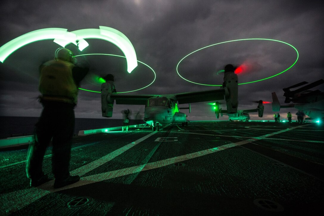 U.S. Navy Sailors with the Boxer Amphibious Ready Group prepare MV-22B Ospreys with Medium Tilt Rotor Squadron 166 Reinforced to take off from the USS New Orleans, February 16, 2016. The Boxer Amphibious Ready Group and the 13th Marine Expeditionary Unit will be operating in the Pacific and central Commands area of responsibilities during their western pacific deployment 16-1. (U.S. Marine Corps photo by Sgt. Tyler C. Gregory/released)