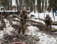 Candidates assigned to Delta Company, Officer Candidates Class-221, work together to complete the Buddy Team Fire and Movement Course at Brown Field, Marine Corps Base Quantico, Va., on Jan. 28, 2016. The mission of Officer Candidates School (OCS) is to "educate and train officer candidates in Marine Corps knowledge and skills within a controlled, challenging, and chaotic environment in order to evaluate and screen individuals for the leadership, moral, mental, and physical qualities required for commissioning as a Marine Corps officer." (U.S. Marine Corps Photo by Cpl. Patrick H. Owens/Released)