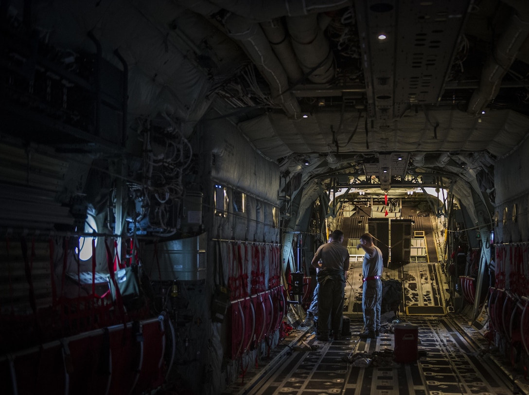 Airmen conduct pre-flight maintenance on a C-130J Super Hercules aircraft on Pope Army Airfield, N.C., Feb. 4, 2016. Air Force photo by Staff Sgt. Marianique Santos