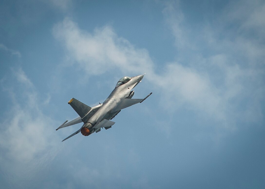 A U.S. Air Force F-16C Fighting Falcon from the 35th Fighter Wing, Misawa Air Base, Japan, performs an aerial demonstration during the Singapore International Airshow, at Changi International Airport Singapore, Feb. 18, 2016. Through participation in airshows and regional events, the U.S. demonstrates its commitment to the security of the Indo-Asia-Pacific region, promotes equipment interoperability, displays the flexible combat capabilities of the U.S. military, and creates lasting relationships with international audiences to strengthen the bonds that support partnership building throughout the Indo-Asia-Pacific region. (U.S. Air Force photo by Capt. Raymond Geoffroy/Released)