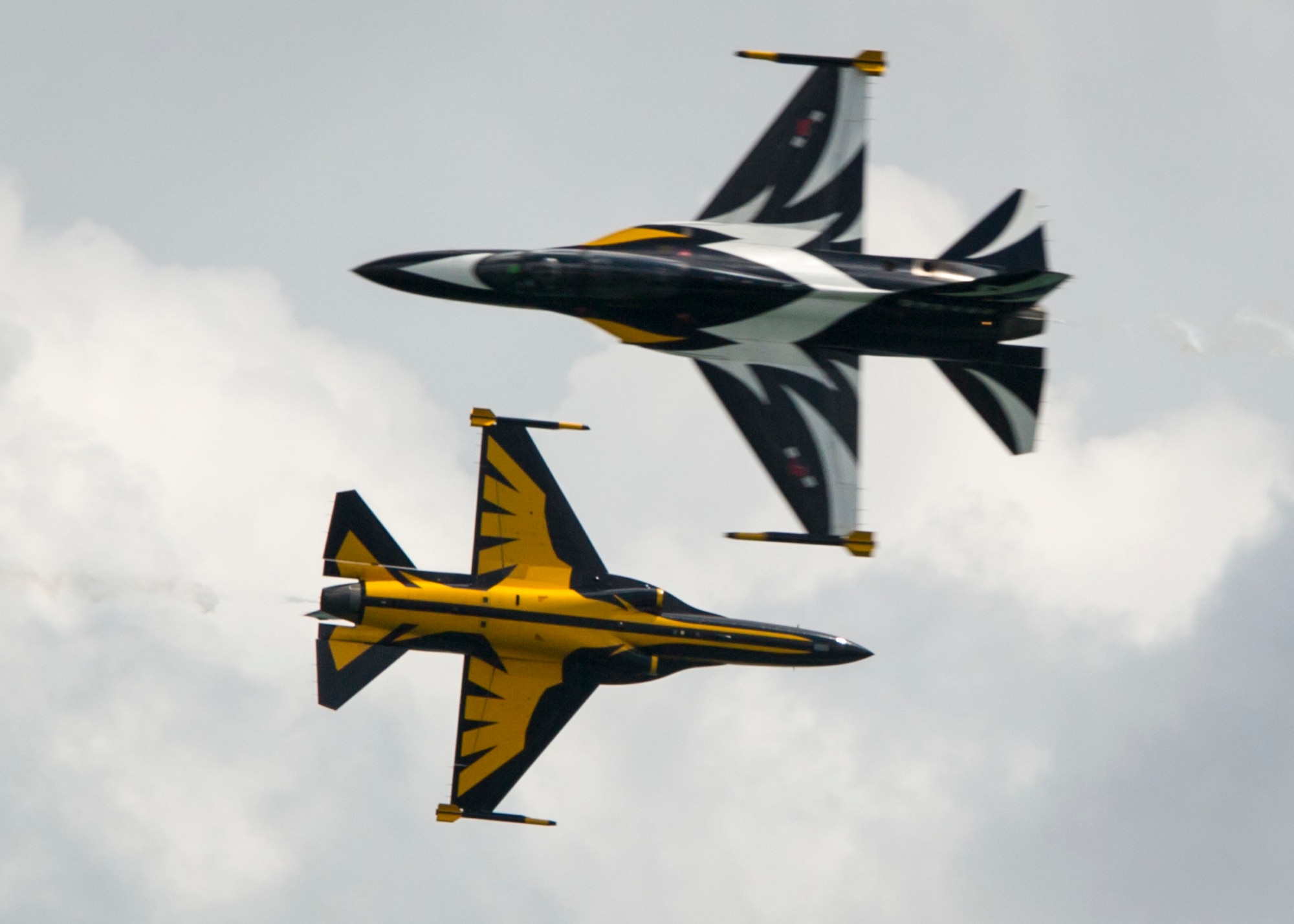 The Republic of Korea Air Force Golden Eagles aerial demonstration team performs during the Singapore International Airshow at Changi International Airport Singapore, Feb. 18, 2016. The show is focused on building strong relations between Singapore, the U.S. and the international community. (U.S. Air Force photo by Capt. Raymond Geoffroy/Released)