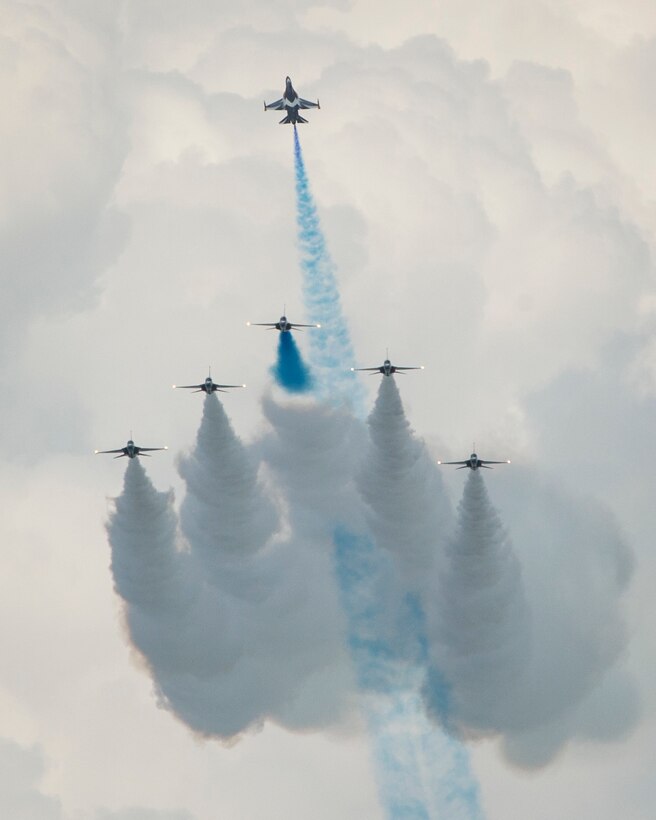 The Republic of Korea Air Force Golden Eagles aerial demonstration team performs during the Singapore International Airshow at Changi International Airport, Singapore, Feb. 18, 2016. The show is focused on building strong relations between Singapore, the U.S. and the international community. (U.S. Air Force photo by Capt. Raymond Geoffroy/Released)