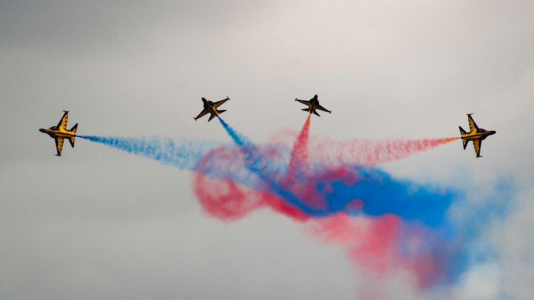 The Republic of Korea Air Force Golden Eagles aerial demonstration team performs during the Singapore International Airshow at Changi International Airport, Singapore, Feb. 18, 2016. The show is focused on building strong relations between Singapore, the U.S. and the international community. (U.S. Air Force photo by Capt. Raymond Geoffroy/Released)