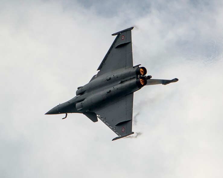 A French Air Force Rafale performs an aerial demonstration during the Singapore International Airshow at Changi International Airport, Singapore, Feb. 18, 2016. During the show, several nations came together to demonstrate their aerial capabilities and build stronger defense ties. (U.S. Air Force photo by Capt. Raymond Geoffroy/Released)