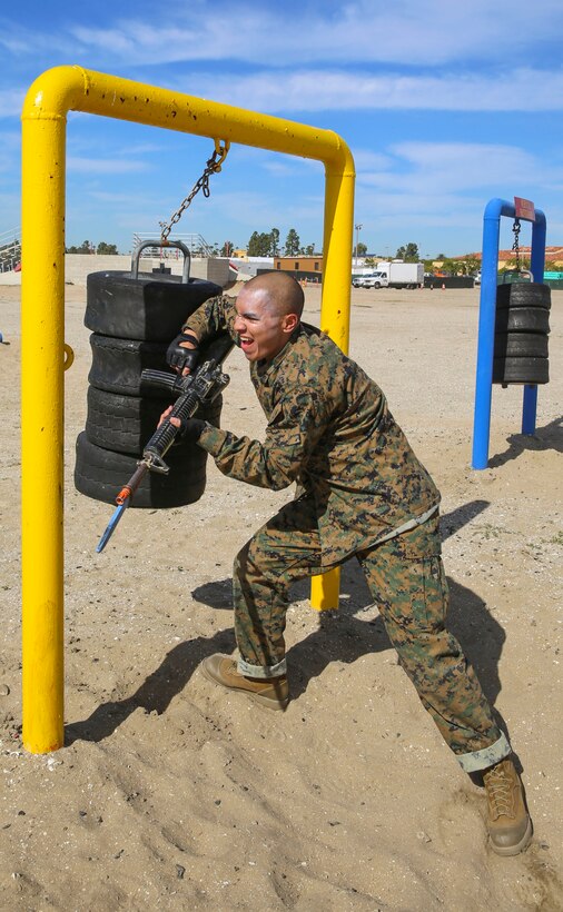 A recruit of Alpha Company, 1st Recruit Training Battalion, conducts a horizontal strike during the Bayonet Assault Course I event at Marine Corps Recruit Depot San Diego, Feb. 10. Drill instructors directed the recruits through the course to ensure they were getting the most out of the event. Annually, more than 17,000 males recruited from the Western Recruiting Region are trained at MCRD San Diego. Alpha Company is scheduled to graduate April 22.