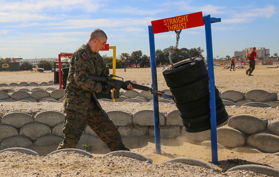 A recruit of Alpha Company, 1st Recruit Training Battalion, executes a straight thrust during the Bayonet Assault Course I event at Marine Corps Recruit Depot San Diego, Feb. 10. Recruits were taught different skills during Marine Corps Martial Arts Program classes and learned offensive and defensive techniques used in combat. Annually, more than 17,000 males recruited from the Western Recruiting Region are trained at MCRD San Diego. Alpha Company is scheduled to graduate April 22.