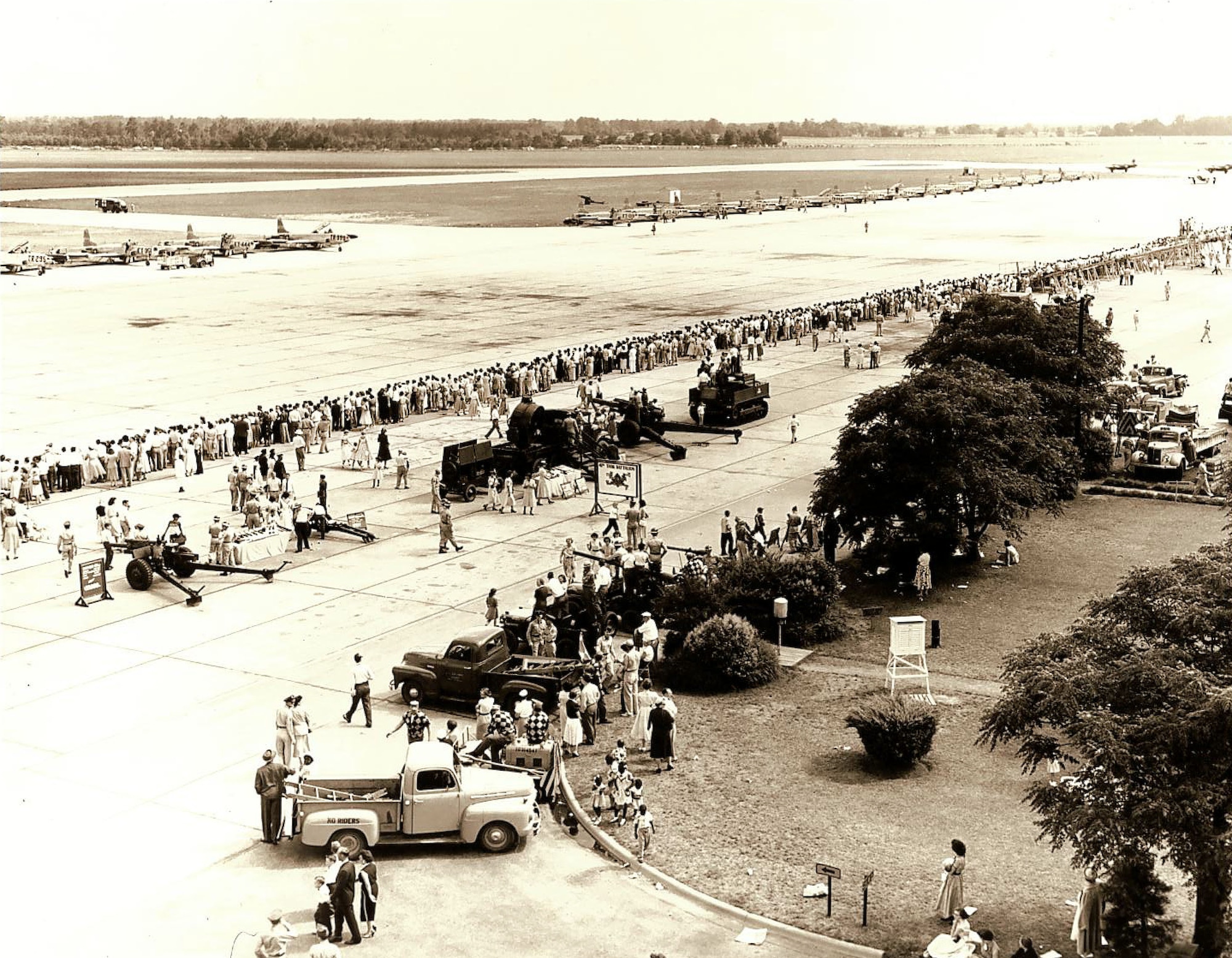 Thousands of men, women and children attend one of the first open houses held at Shaw Air Force Base, S.C., May 16, 1954. During the open house, attendees saw demonstrations from armed forces personnel such as helicopter rescue teams, and got an up-close look at modern aircraft of the time, including B-25 Mitchells, RB-54A Canberras and RF-80 Shooting Stars, all of which are no longer in service. (Photo courtesy of 20th Fighter Wing historian) 