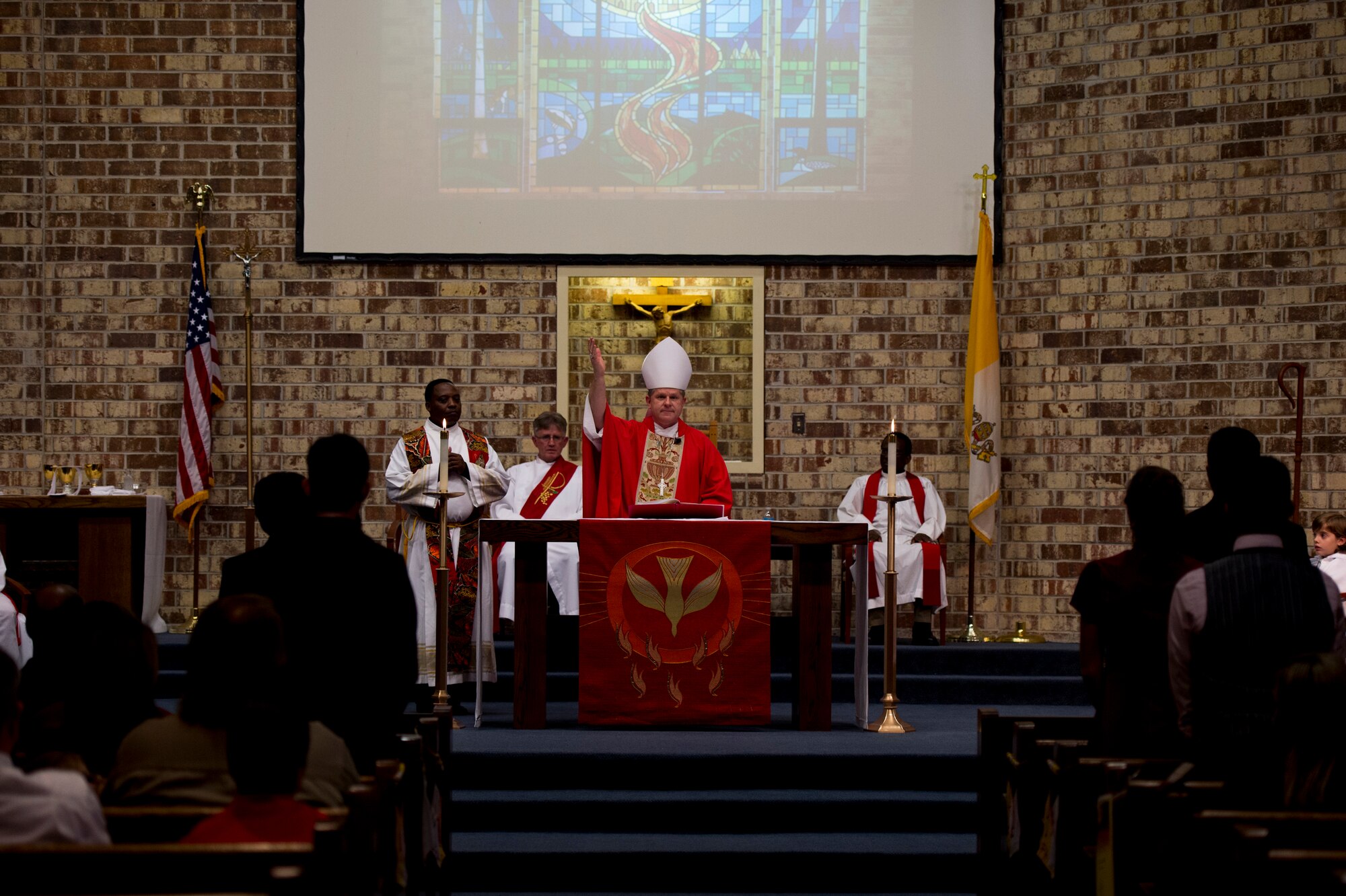 Bishop Robert Coyle, Archdiocese for the Military Service, speaks to the congregation during the Confirmation Mass, Feb. 16, 2016, at Moody Air Force Base, Ga. Confirmation is an important part of a Catholic’s religious journey. (U.S. Air Force photo by Staff Sgt. Eric Summers Jr./Released)