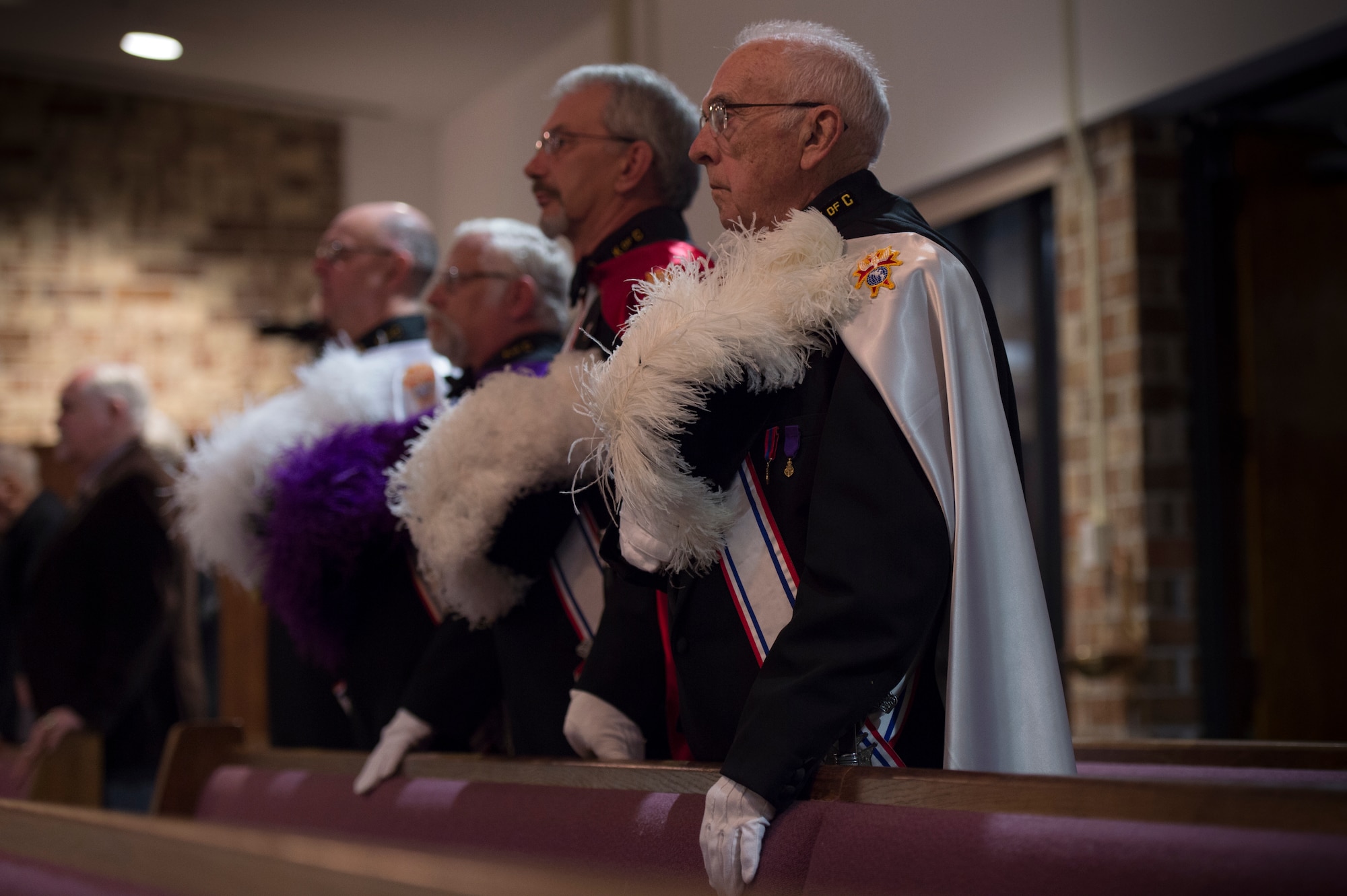 Members of the Knights of Columbus stand as Bishop Robert Coyle, Archdiocese for Military Service, welcomes the congregation to the Confirmation Mass, Feb. 16, 2016, at Moody Air Force Base, Ga. The Knights of Columbus is a catholic fraternal benefit society founded on the principles of charity, unity and fraternity. (U.S. Air Force photo by Staff Sgt. Eric Summers Jr./Released)