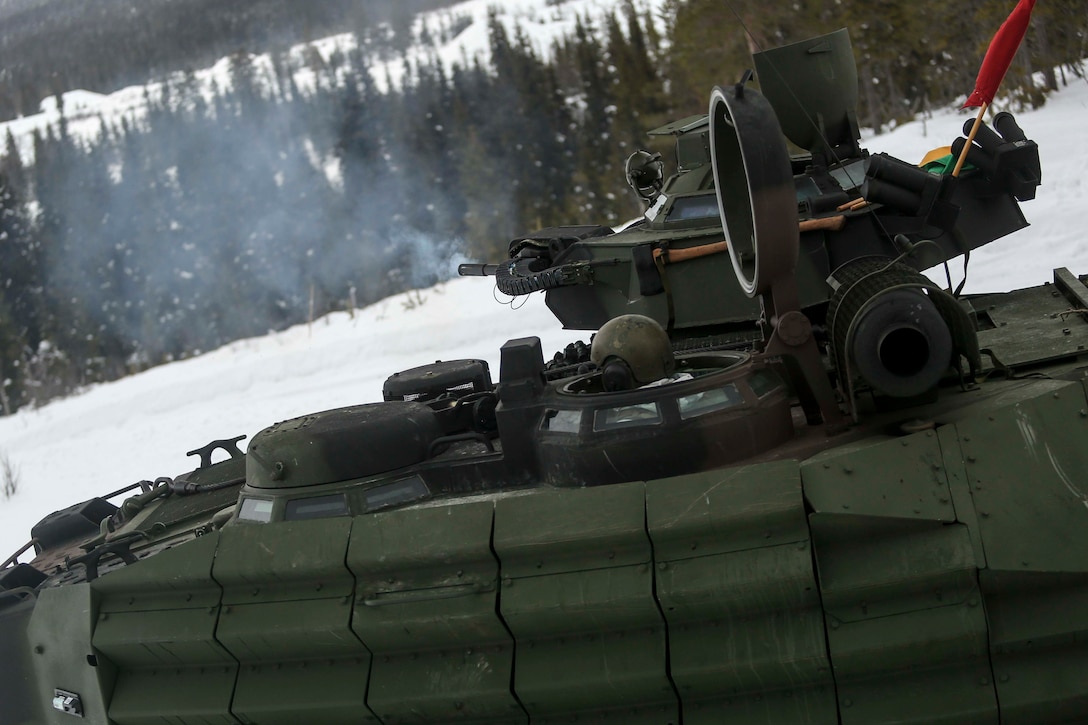 The Mk 19 of an amphibious assault vehicle fires across the valley of a range in Rena, Norway during a live-fire exercise Feb. 17, 2016. The Marines and the Norwegian Army are preparing themselves for Exercise Cold Response 16, which will bring together 12 NATO allies and partner nations and approximately 16,000 troops in order to enhance joint crisis response capabilities in cold weather environments. (U.S. Marine Corps photo by Cpl. Dalton A. Precht/released)