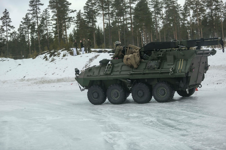 U.S. Marines with Combined Arms Company break loose their Light Armored Vehicles during the ice driving course in Rena, Norway, Feb. 17, 2016. The Marines were getting behind the wheel on the icy pathway in order to understand how to control their heavy vehicles on the slick terrain. The Marines worked and learned alongside members of the Norwegian Army in order to better understand how one another operate. (U.S. Marine Corps photo by Cpl. Dalton A. Precht/released)
