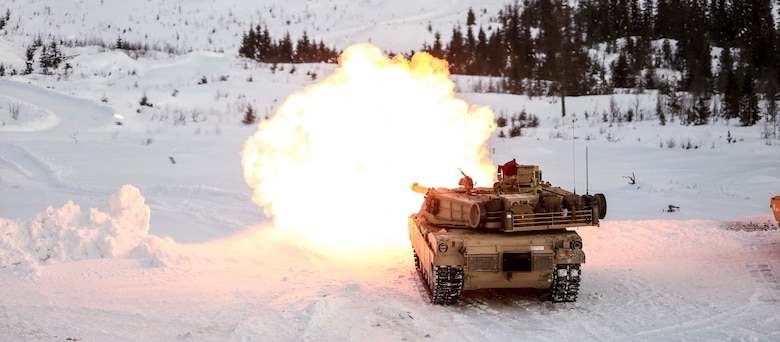 A M1A1 Abrams tank fires its main gun as it takes part in a live-fire exercise in Rena, Norway, Feb. 18, 2016. The Marines are preparing themselves for Exercise Cold Response 16, which will bring together 12 NATO allies and partner nations and approximately 16,000 troops in order to enhance joint crisis response capabilities in cold weather environments. (U.S. Marine Corps photo by Cpl. Dalton A. Precht/released)