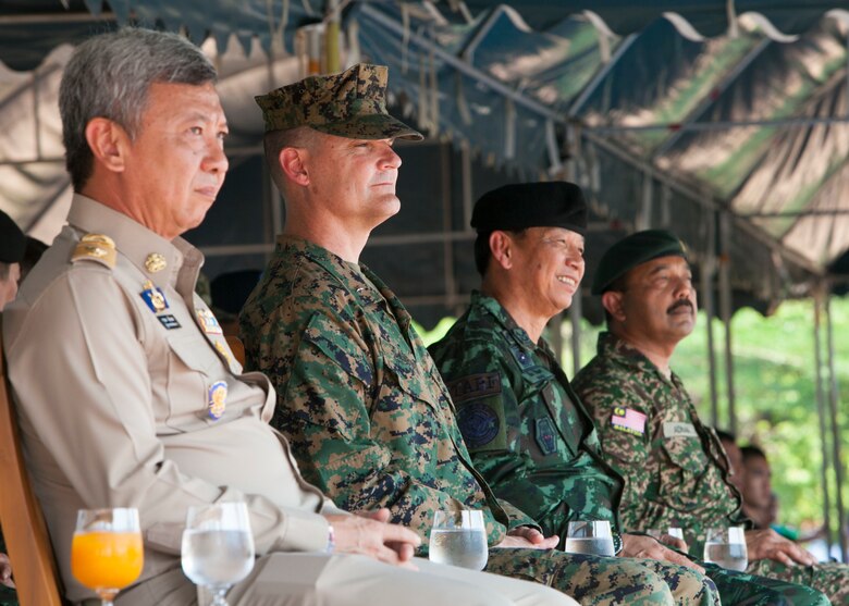 Left to right: Mr. Channa Eiumsang, governor of Trat Province; U.S. Marine Corps Brig. Gen. Russell Sanborn, commanding general of 1st Marine Aircraft Wing, III Marine Expeditionary Force; Royal Thai Army Gen. Wichien Sirisoonthorn, Royal Thai Armed Forces Headquarters; Malaysian Army Lt. Col. Made Trika, Malaysian Armed Forces. The distinguished visitors watched the dedication ceremony of a one-room multi-purpose educational building Feb. 18 at Ban Sa Yai, Trat, Thailand. The construction at Ban Sa Yai was one of six humanitarian civic action sites in which the Thai, U.S. and partner nation’s militaries will worked together on civic programs during Cobra Gold 2016. Cobra Gold, in its 35th iteration, demonstrates the commitment of the Kingdom of Thailand and the U.S. to our long-standing alliance and regional partnership toward advancing prosperity and security in the Indo-Asia Pacific region.  (U.S. Marine Corps photo by SSgt. Jose O. Nava/Released)
